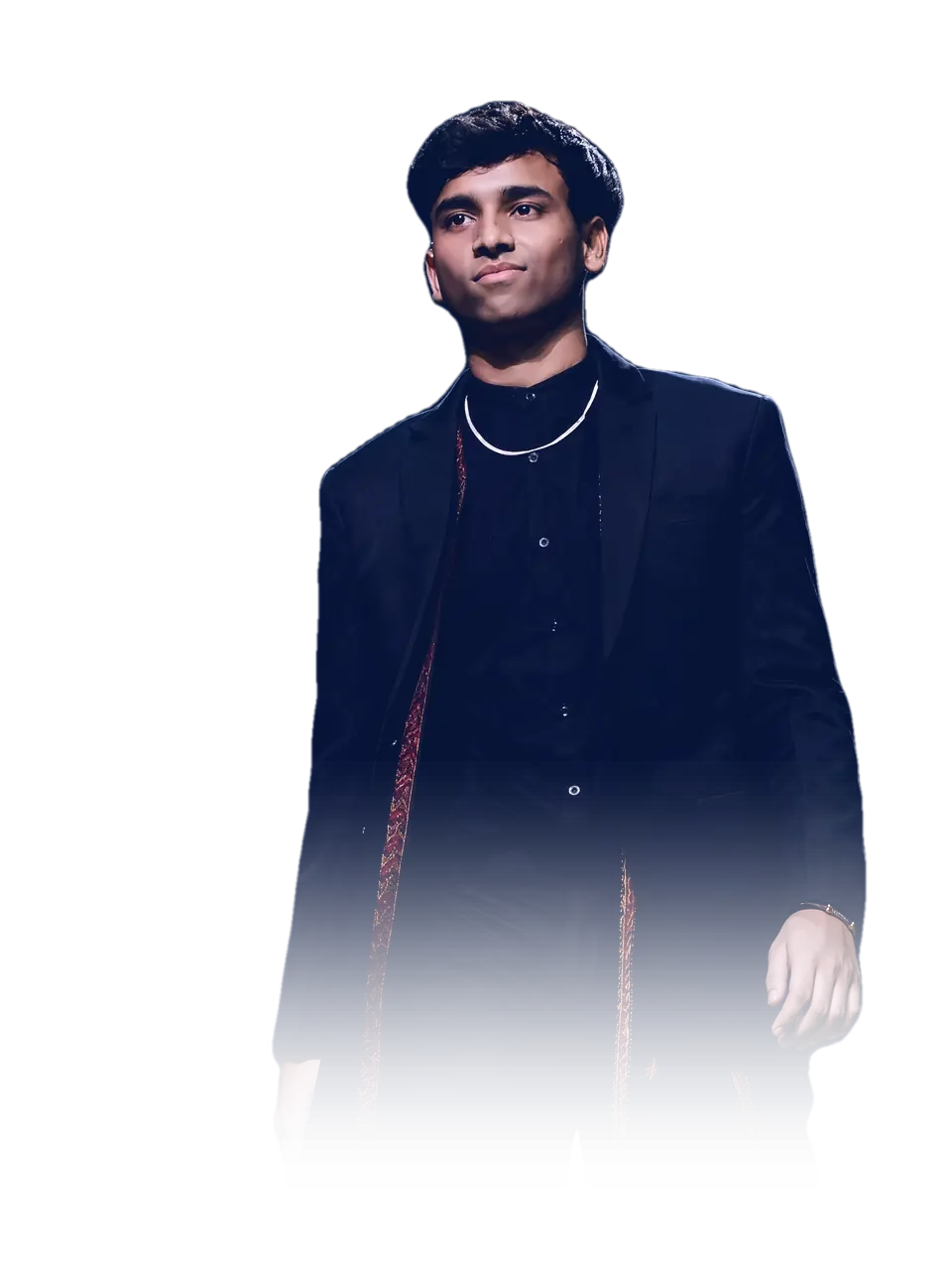 Syed Mohammad Kaif on stage in a black suit and an embroidered shawl